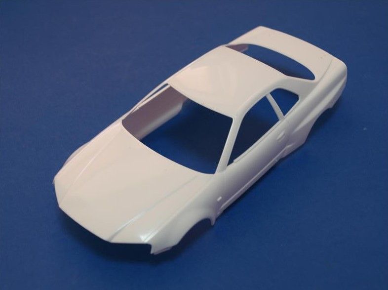 Збірна модель 1/24 автомобіль Nissan Skyline GT-R V-Spec R34 Tamiya TAM24210 TAM24210 фото